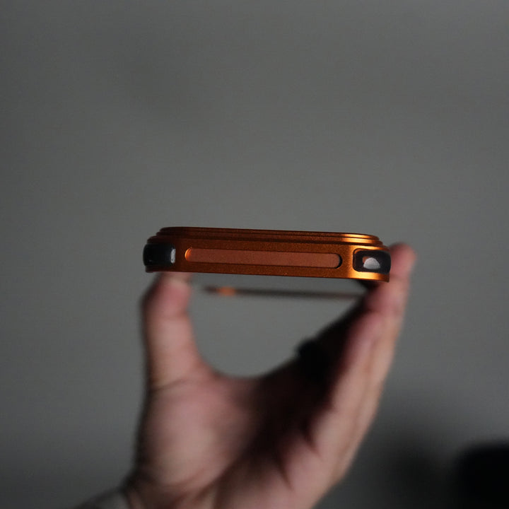 iPhone 17 Series Kevlar Fiber Texture Frameless Metal Kickstand Case | Orange