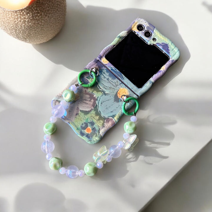 Samsung Galaxy Z Flip 6 Wavy Design Floral Print Glossy Back Case Cover With Crystal Pearl Chain