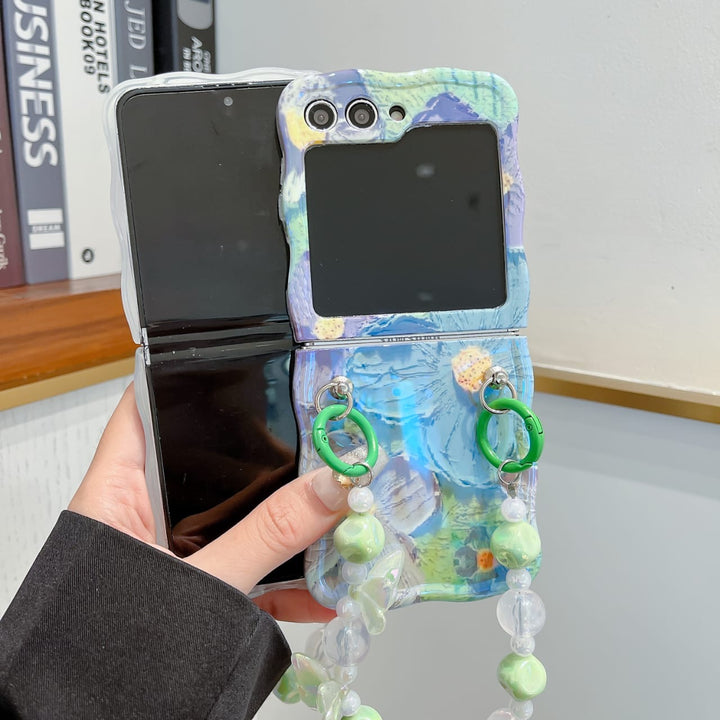 Samsung Galaxy Z Flip 6 Wavy Design Floral Print Glossy Back Case Cover With Crystal Pearl Chain