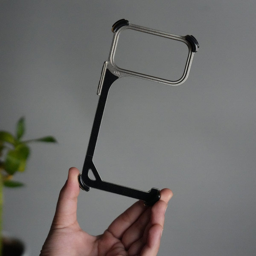 FRATO Aeroflex Metal iPhone 17 Pro max 9-Shaped Frameless Metal Bumper Case with Hidden Lens Stand | Shockproof Aviation-Grade Alloy Frame