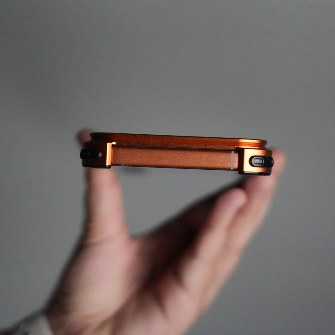 FRATO Aeroflex Metal iPhone 17 Pro max 9-Shaped Frameless Metal Bumper Case with Hidden Lens Stand | Shockproof Aviation-Grade Alloy Frame