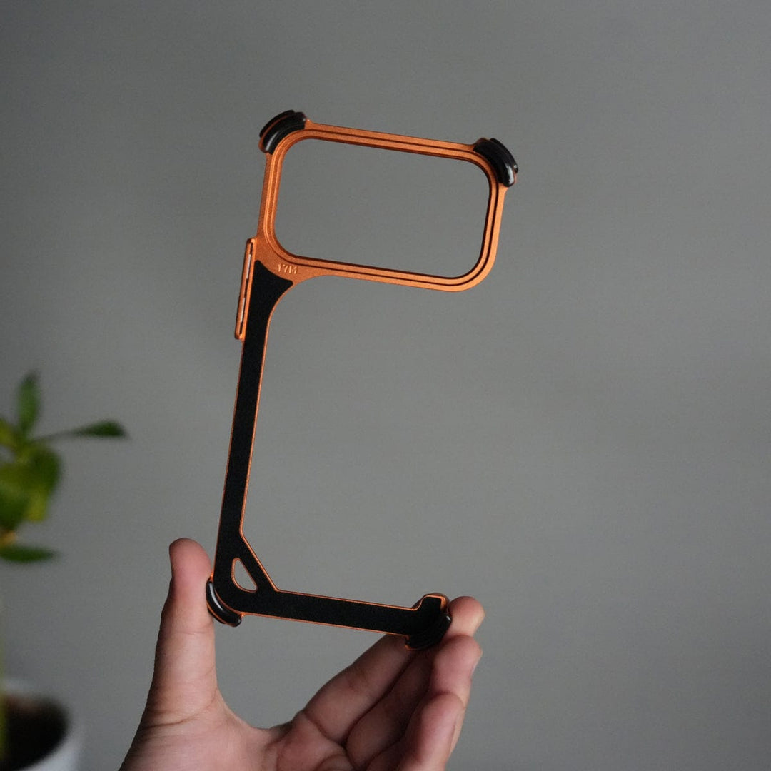 FRATO Aeroflex Metal iPhone 17 Pro max 9-Shaped Frameless Metal Bumper Case with Hidden Lens Stand | Shockproof Aviation-Grade Alloy Frame