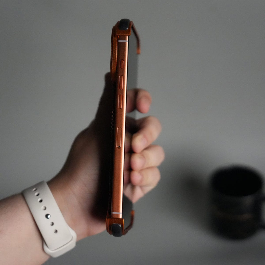 FRATO Aeroflex Metal iPhone 17 Series Kevlar Fiber Texture Frameless Metal Kickstand Case | Orange