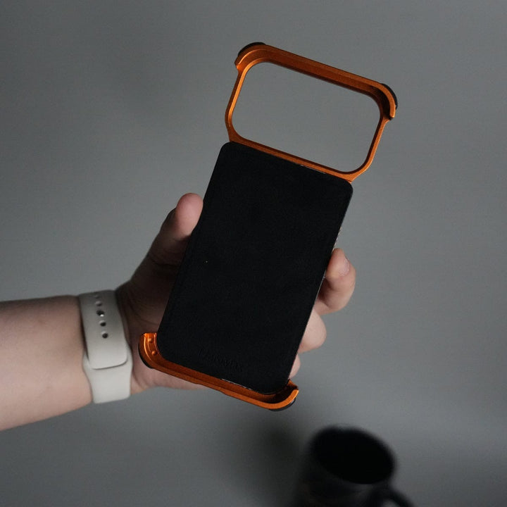 FRATO Aeroflex Metal iPhone 17 Series Kevlar Fiber Texture Frameless Metal Kickstand Case | Orange