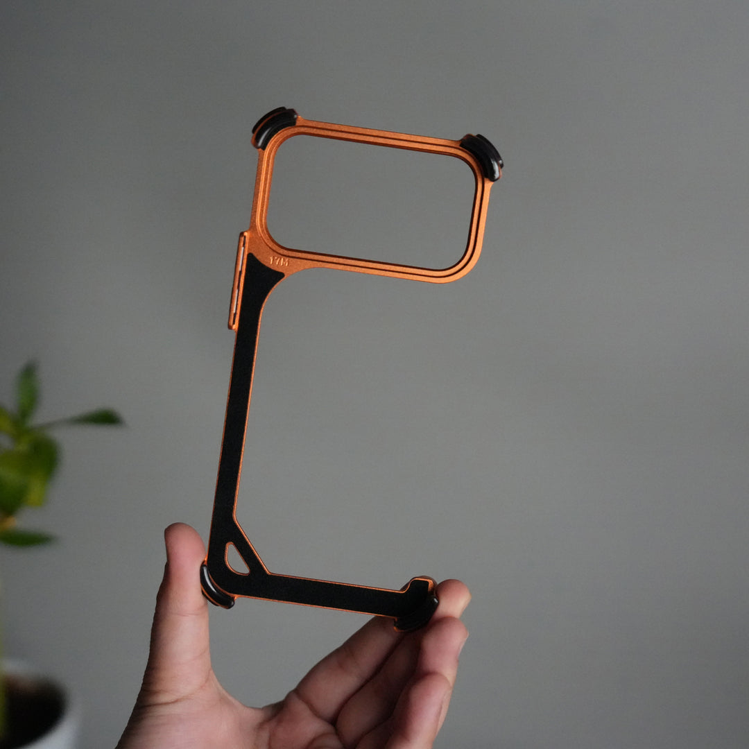iPhone 17 Pro 9-Shaped Frameless Metal Bumper Case with Hidden Lens Stand | Shockproof Aviation-Grade Alloy Frame