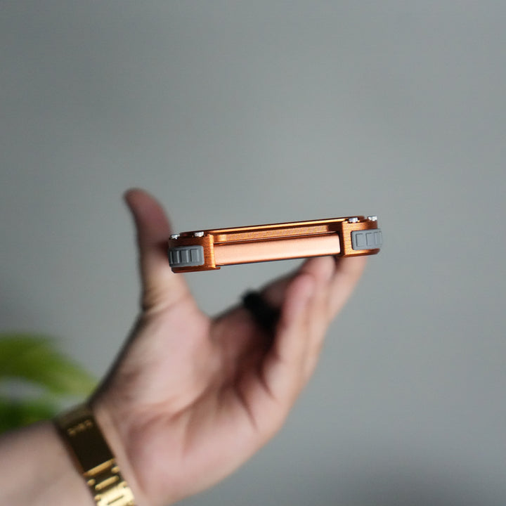 iPhone 17 Series Premium Orange Line Carbon Design Aluminium Metal Snap On Rotating Stand Case